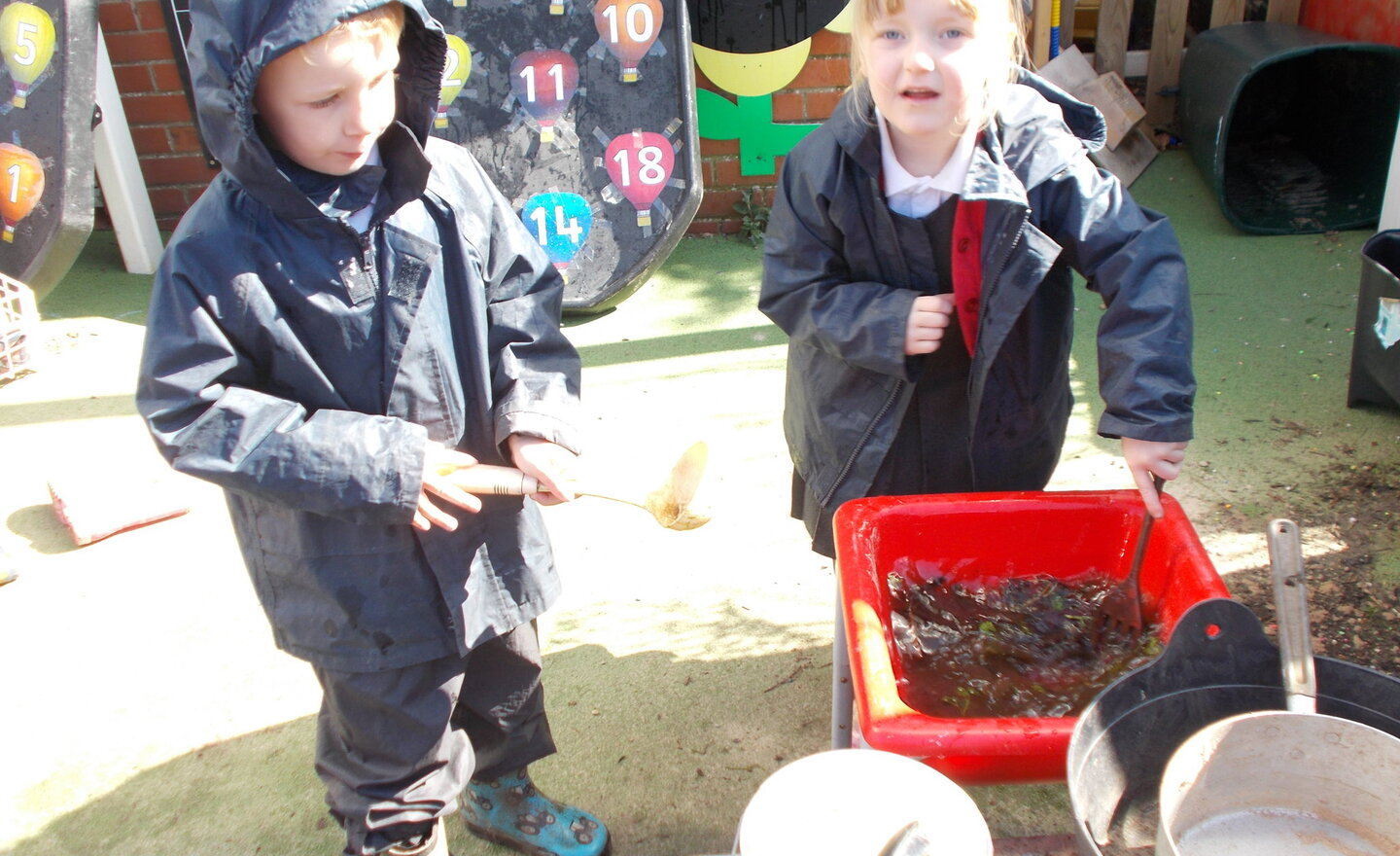 Image of Making mud pies =]